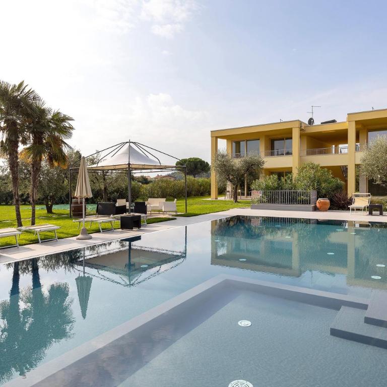 Agriturismo Le Campagnole Green - Appartamento Deluxe con 2 Camere da Letto e Vista Giardino - 1