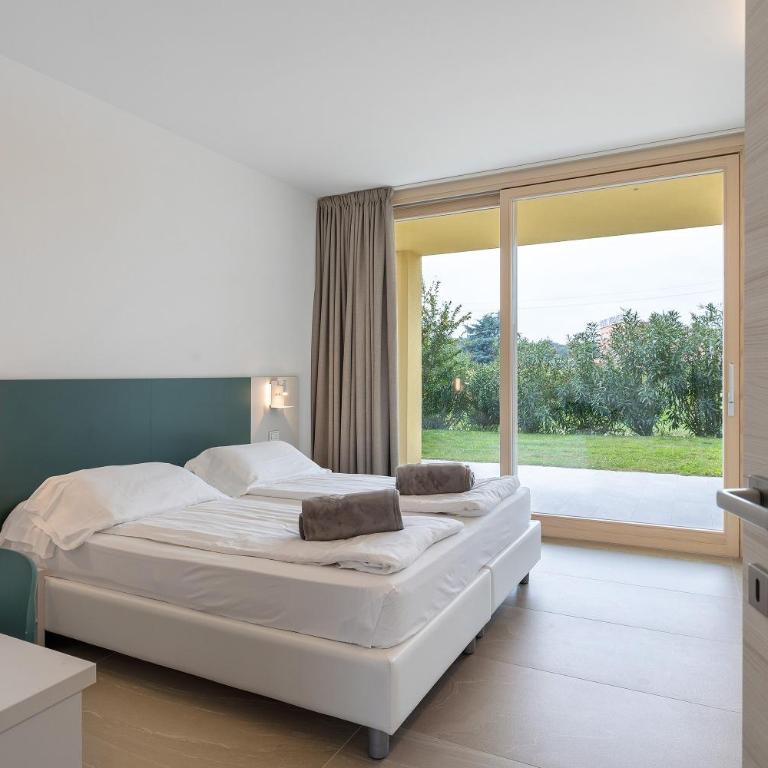 Agriturismo Le Campagnole Green - Appartamento Deluxe con 2 Camere da Letto e Vista Giardino - 8
