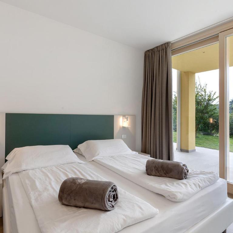 Agriturismo Le Campagnole Green - Appartamento Deluxe con 2 Camere da Letto e Vista Giardino - 9