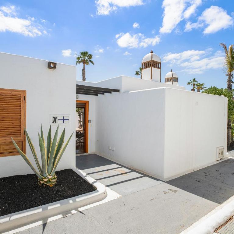 Puerto Chico X - Apartamento Deluxe de 2 dormitorios con vistas al jardín - 26