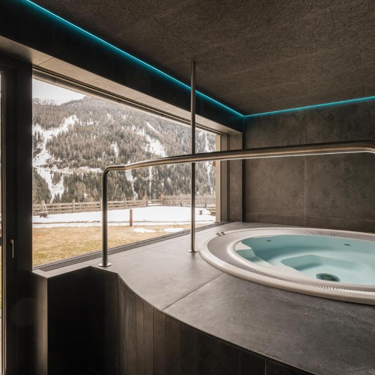Bruneggerhof Weissenbach - Deluxe-Apartment mit 2 Schlafzimmern und Gartenblick - 8