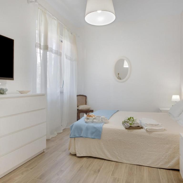 Un'oasi al Mare - Appartamento Deluxe con 2 Camere da Letto e Vista Giardino - 11