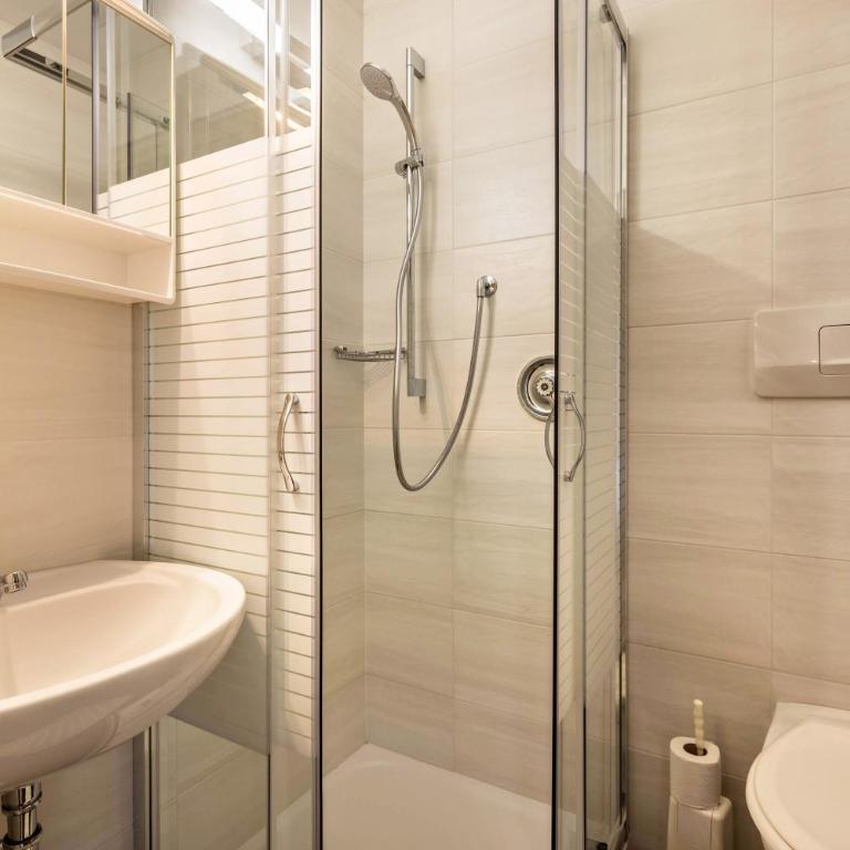 Residence Condor Apt Rosengarten - Appartamento Deluxe con 2 Camere da Letto e Vista Giardino - 18