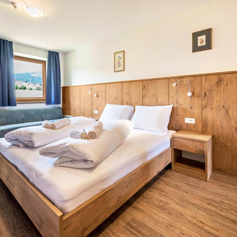 Residence Condor Apt Rosengarten - Appartamento Deluxe con 2 Camere da Letto e Vista Giardino - 10