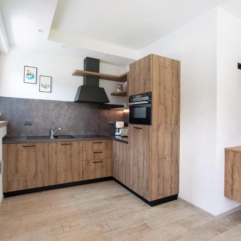 Chalet Snowlake Appartamento Neve - Appartamento Deluxe con 2 Camere da Letto e Vista Giardino - 9
