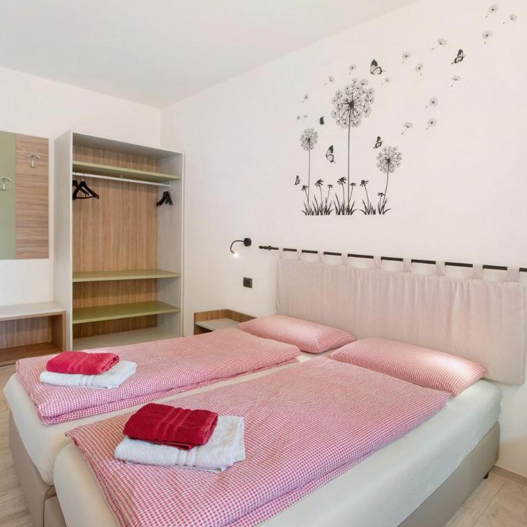 Chalet Snowlake Appartamento Neve - Appartamento Deluxe con 2 Camere da Letto e Vista Giardino - 13