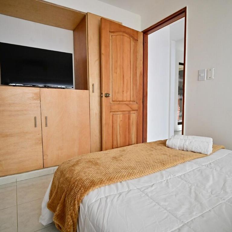 Casa con piscina y terraza privada a pasos de la playa - Three-Bedroom Home - 31
