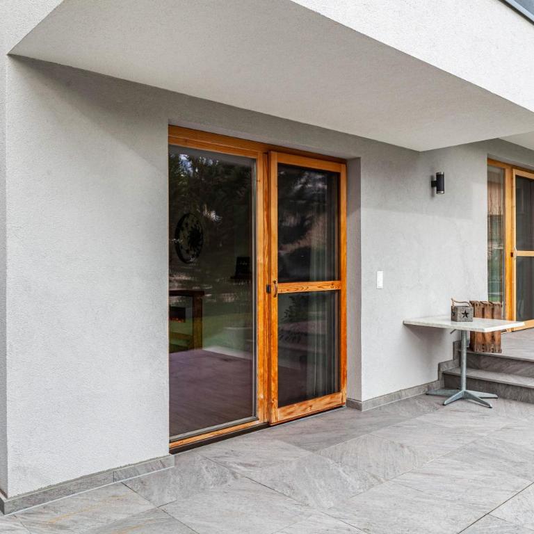 Apart-hochzillertal Gartenwohnung - Apartment mit 3 Schlafzimmern und Bergblick - 8
