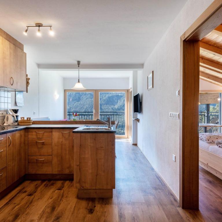 Thusnelda Apartment A - Appartamento Deluxe con 2 Camere da Letto e Vista Giardino - 10