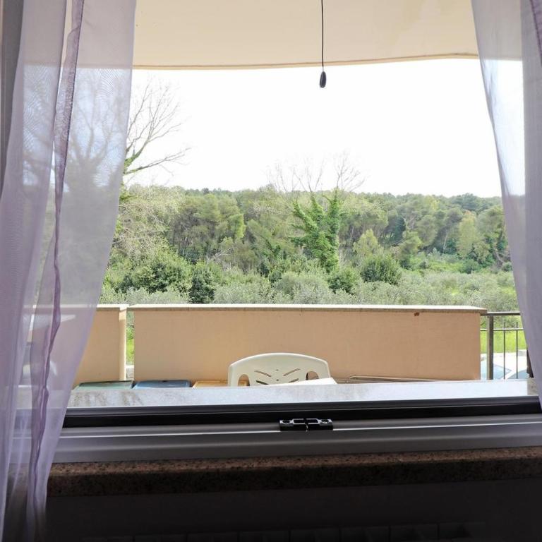 Casa Vacanza Claudia Otranto - Appartamento Deluxe con 2 Camere da Letto e Vista Giardino - 7