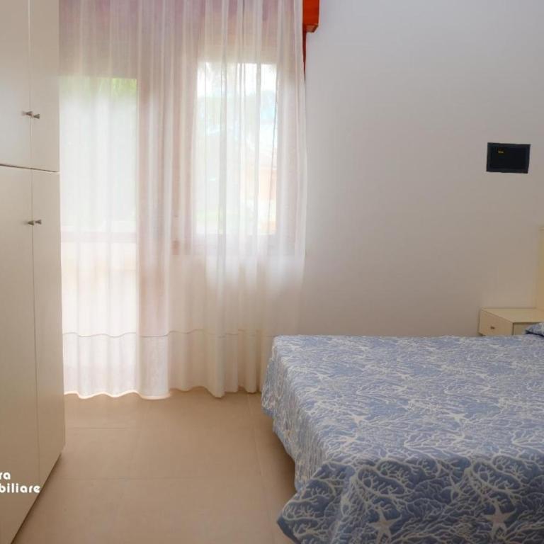 Residence Equilio A10 - Appartamento Deluxe con 2 Camere da Letto e Vista Giardino - 10