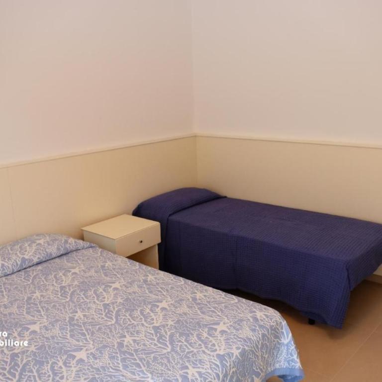 Residence Equilio A10 - Appartamento Deluxe con 2 Camere da Letto e Vista Giardino - 12