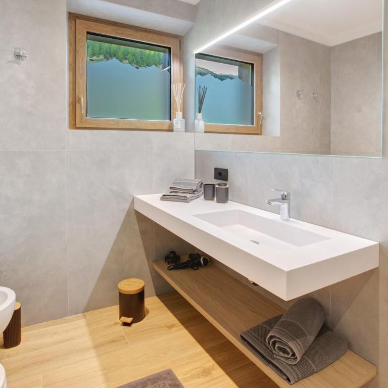 Chalet Ale Livigno - Appartamento Deluxe con 2 Camere da Letto e Vista Giardino - 19