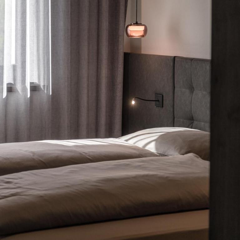 Köfele Lodge Rosa - Deluxe-Apartment mit 2 Schlafzimmern und Gartenblick - 11