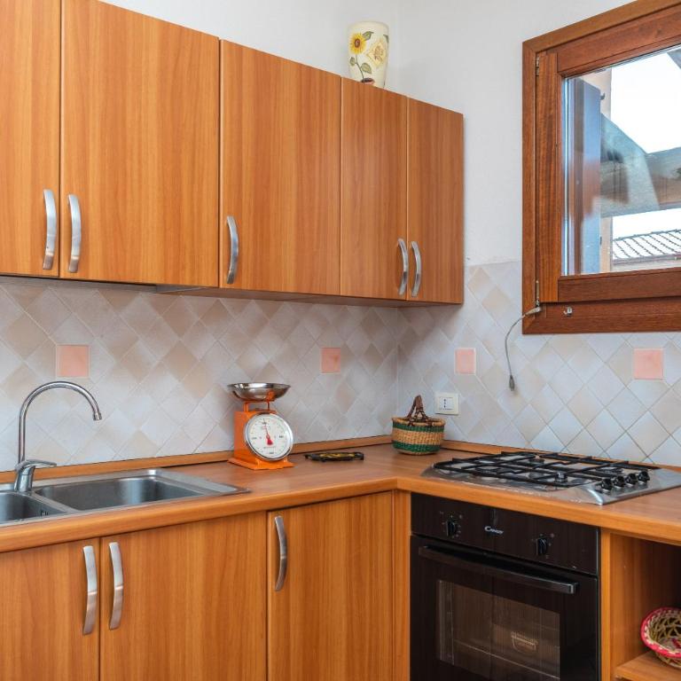 Appartamento I Lecci - Appartamento Deluxe con 2 Camere da Letto e Vista Giardino - 10