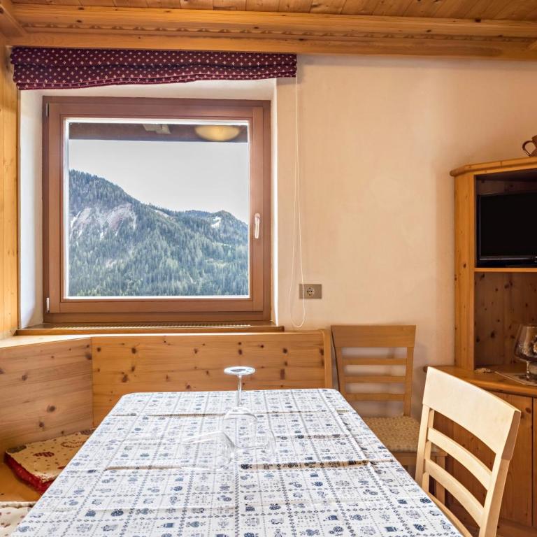 Appartamento Confolia 3 piano terra - Appartamento Deluxe con 2 Camere da Letto e Vista Giardino - 6