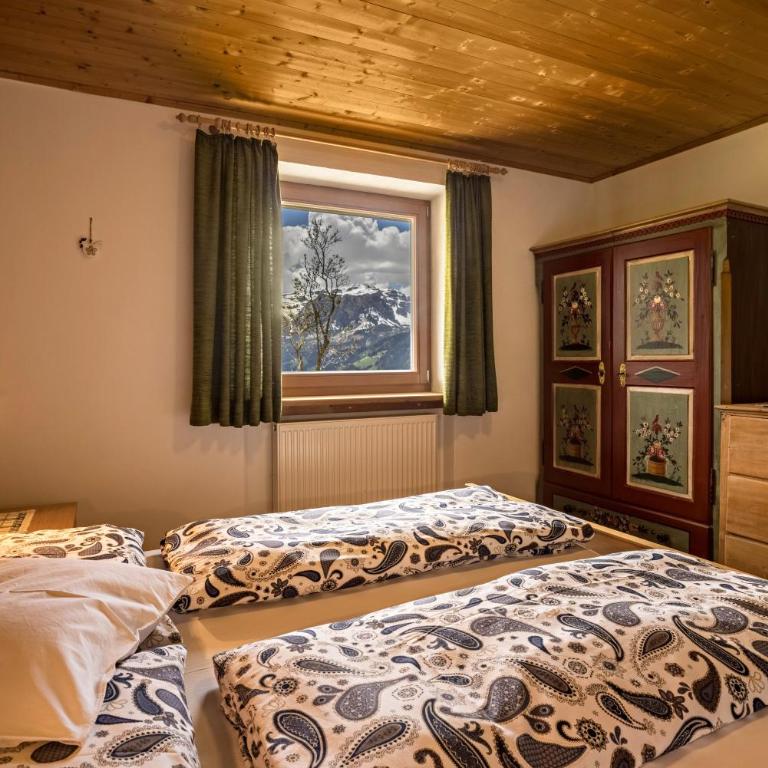Appartamento Confolia 3 piano terra - Appartamento Deluxe con 2 Camere da Letto e Vista Giardino - 13