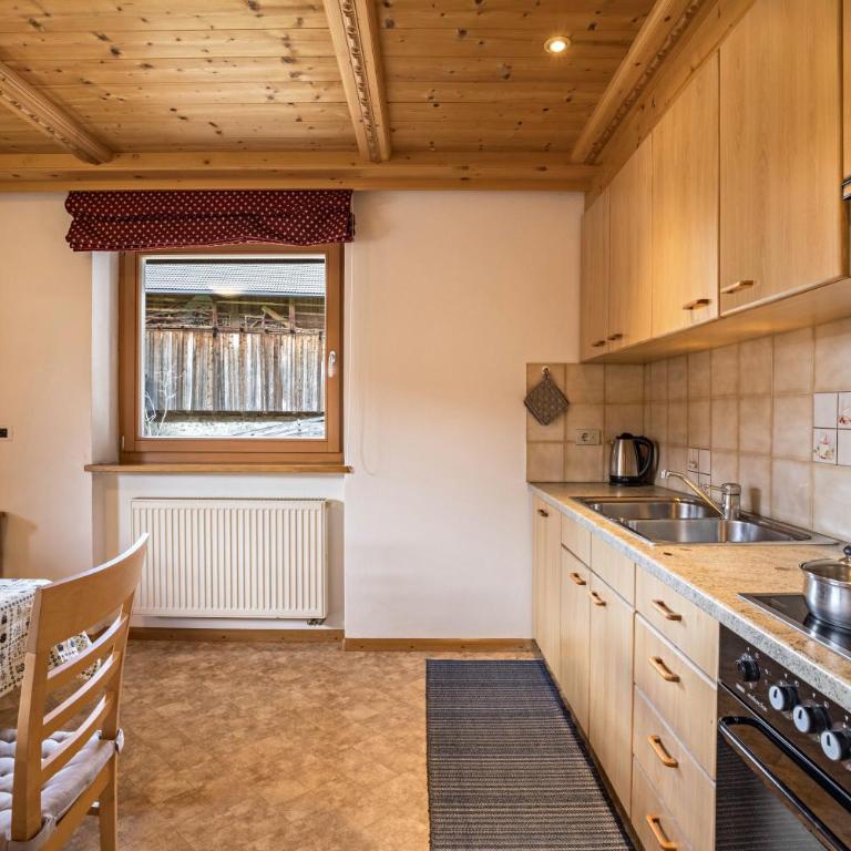 Appartamento Confolia 3 piano terra - Appartamento Deluxe con 2 Camere da Letto e Vista Giardino - 10