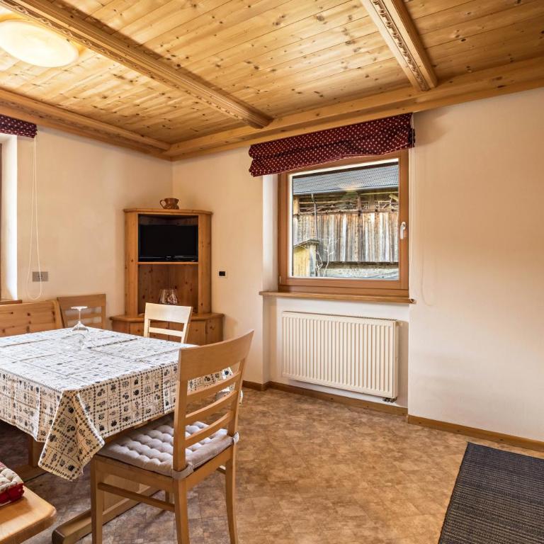 Appartamento Confolia 3 piano terra - Appartamento Deluxe con 2 Camere da Letto e Vista Giardino - 9