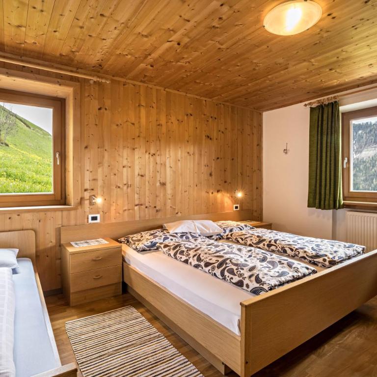 Appartamento Confolia 3 piano terra - Appartamento Deluxe con 2 Camere da Letto e Vista Giardino - 11
