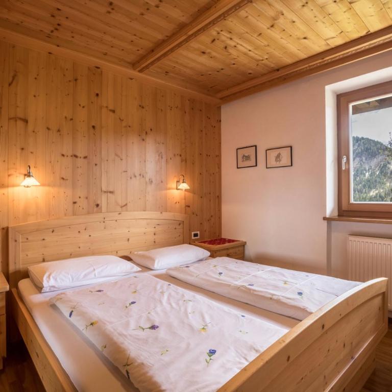 Appartamento Confolia 3 piano terra - Appartamento Deluxe con 2 Camere da Letto e Vista Giardino - 14