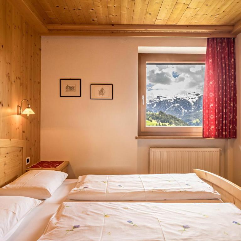 Appartamento Confolia 3 piano terra - Appartamento Deluxe con 2 Camere da Letto e Vista Giardino - 16