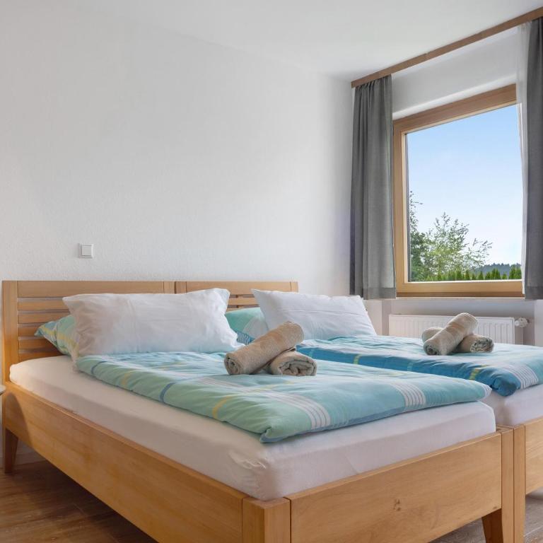 Ferienwohnungen Familie Hofer - Deluxe-Apartment mit 2 Schlafzimmern und Gartenblick - 8