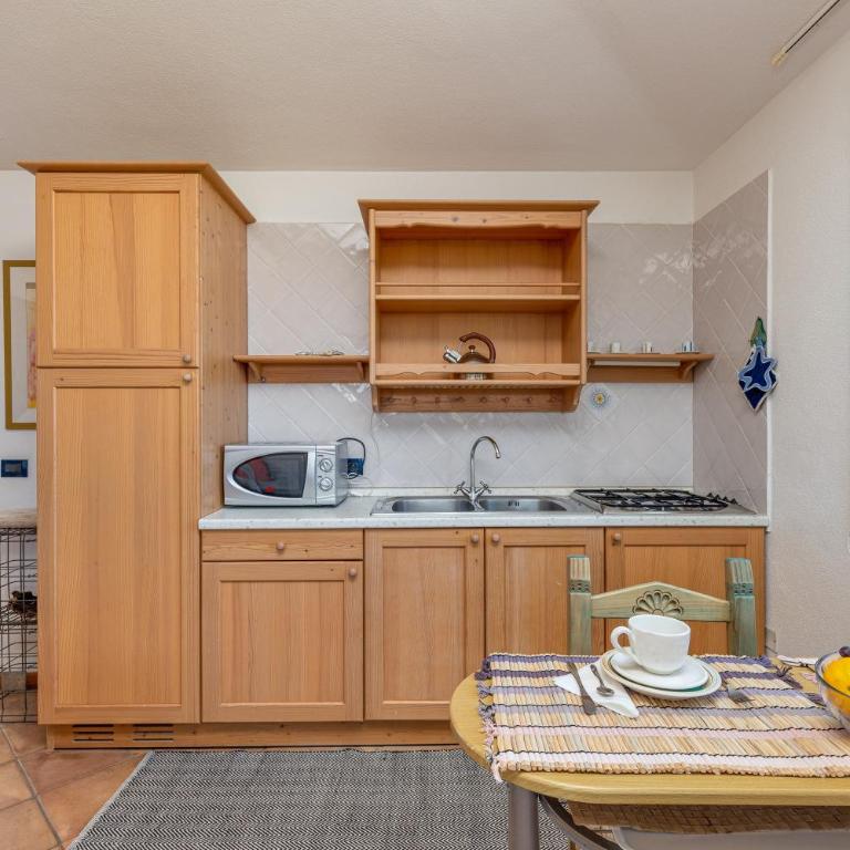 4 Appartamento Cala Brandinchi - Appartamento Deluxe con 2 Camere da Letto e Vista Oceano - 15