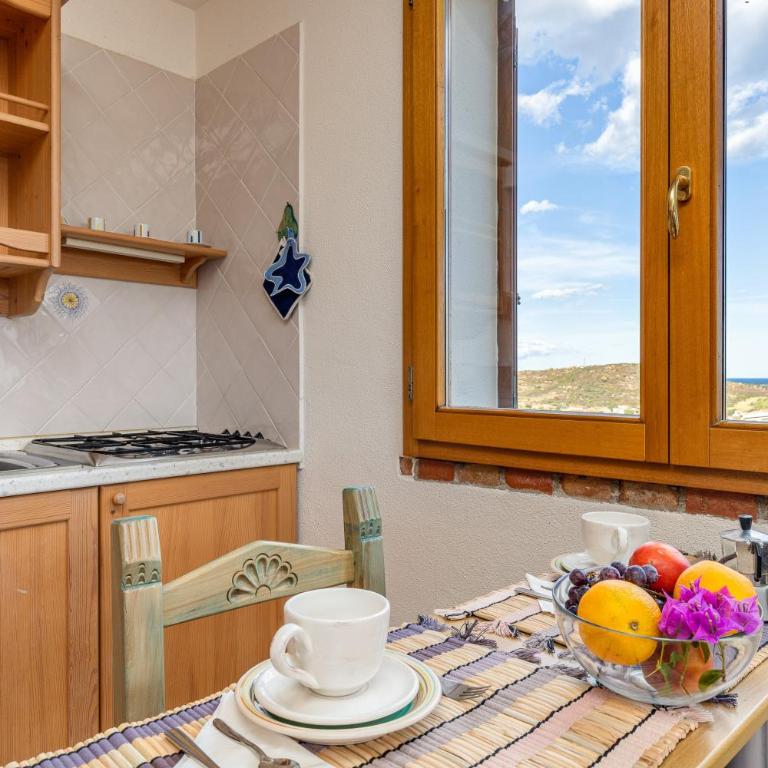 4 Appartamento Cala Brandinchi - Appartamento Deluxe con 2 Camere da Letto e Vista Oceano - 16