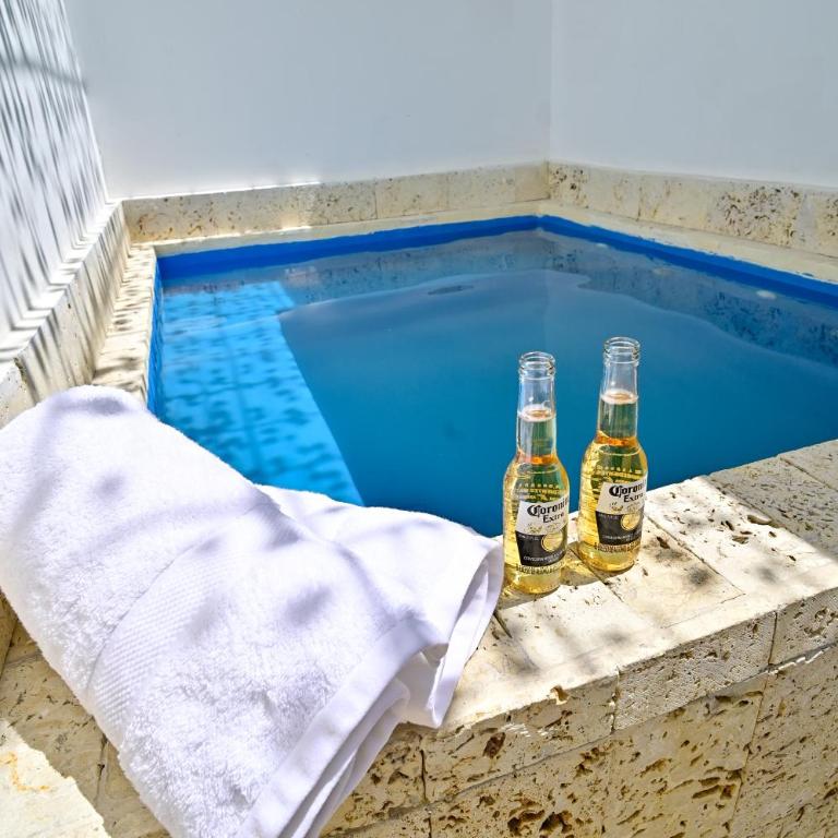 Casa con piscina y terraza privada a pasos de la playa - Three-Bedroom Home - 17