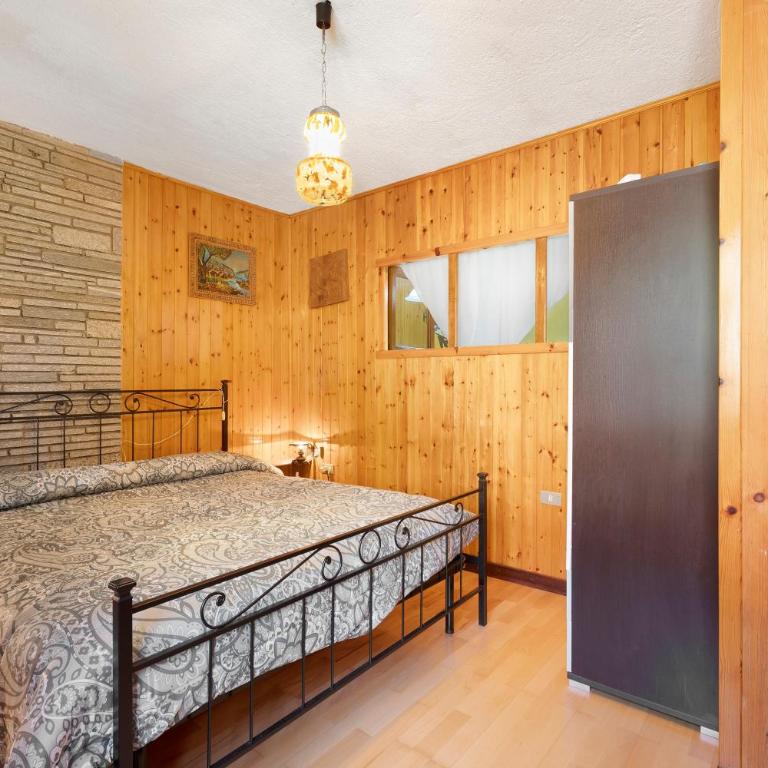 Casa Vacanza Famiglia Belli - Appartamento Deluxe con 2 Camere da Letto e Vista Giardino - 11
