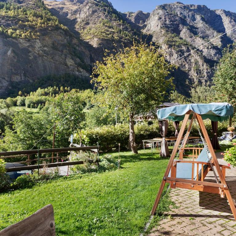 Casa Vacanza Famiglia Belli - Appartamento Deluxe con 2 Camere da Letto e Vista Giardino - 3