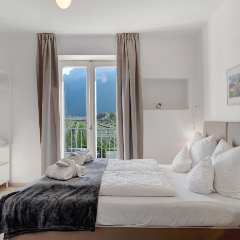 Haus Burger Vilpian - Doppelzimmer mit Bergblick - 11