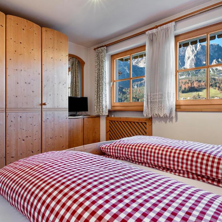 Apartments Campagnola - Appartamento Deluxe con 2 Camere da Letto e Vista Giardino - 14