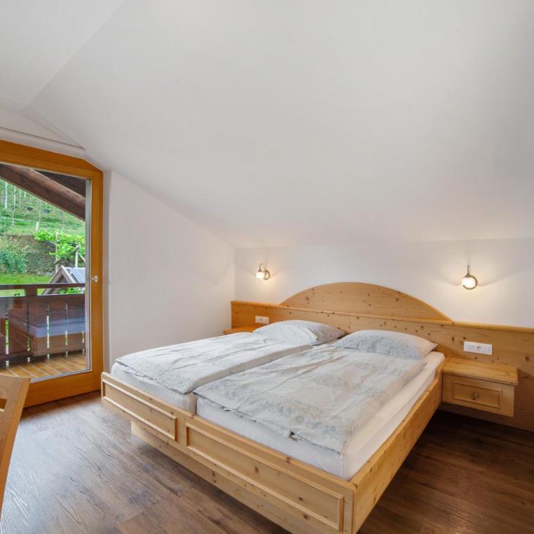 Oberötzbauer Apartment Enzian - Deluxe-Apartment mit 2 Schlafzimmern und Gartenblick - 7