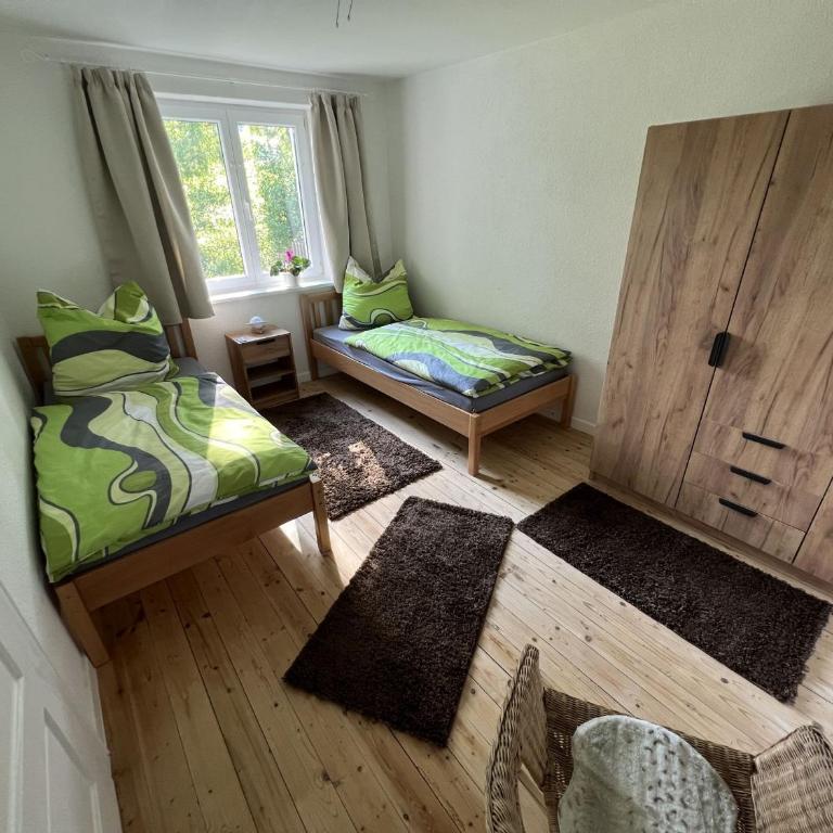 Ferienwohnung Karbachtal - Deluxe-Apartment mit 2 Schlafzimmern und Gartenblick - 11
