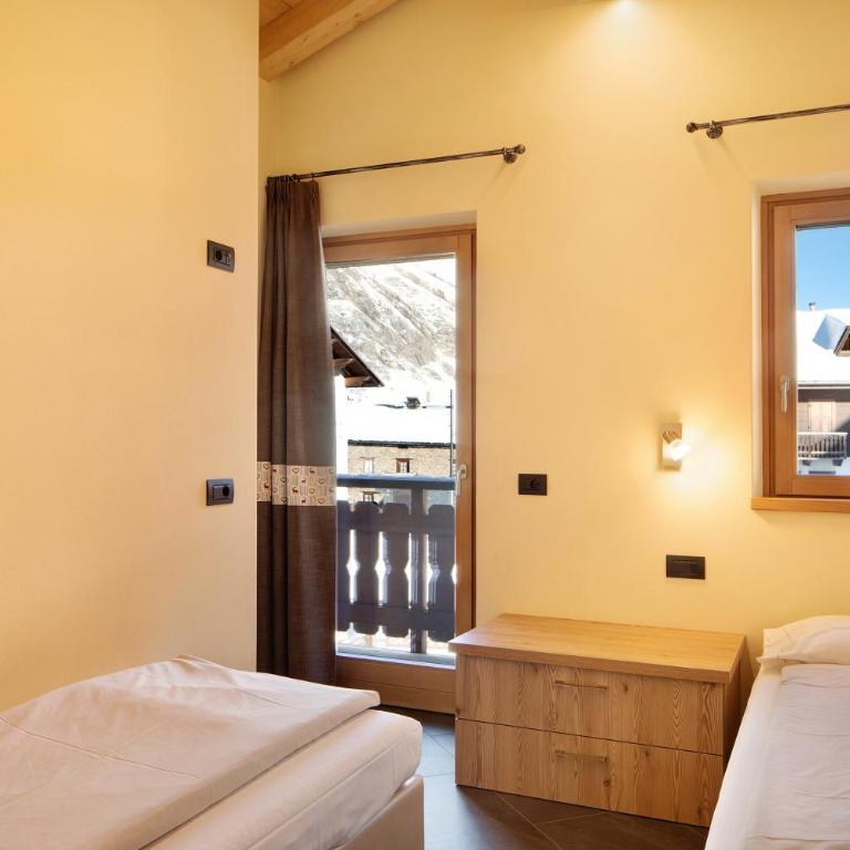 Rasia Residence Relax Wood - Appartamento Deluxe con 2 Camere da Letto e Vista Giardino - 19