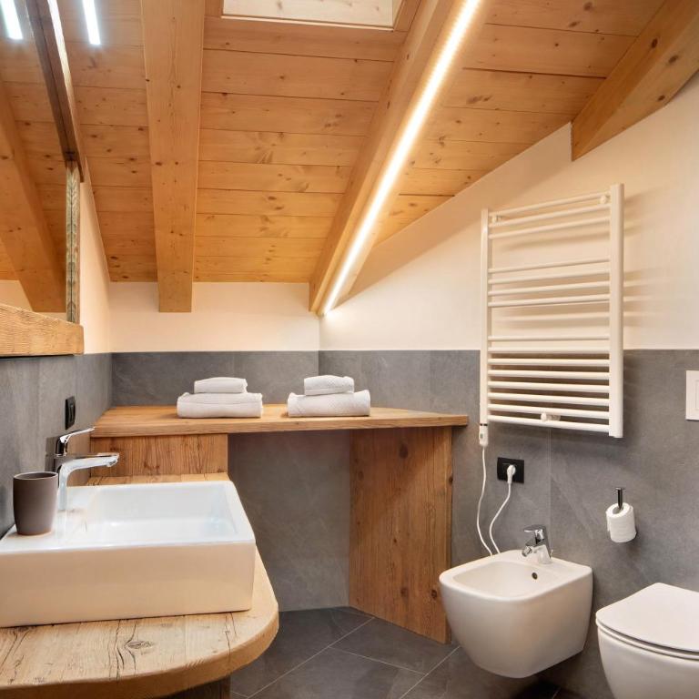 Rasia Residence Relax Wood - Appartamento Deluxe con 2 Camere da Letto e Vista Giardino - 14