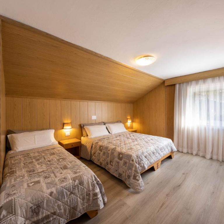 Appartamento Primavera 4 - Appartamento Deluxe con 2 Camere da Letto e Vista Giardino - 4