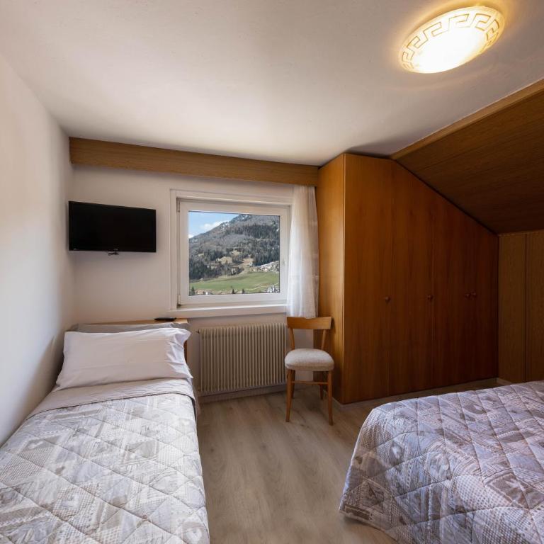 Appartamento Primavera 4 - Appartamento Deluxe con 2 Camere da Letto e Vista Giardino - 8