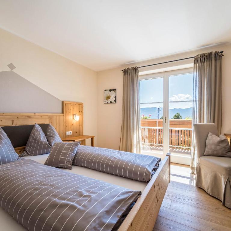 Alber Ferienwohnung Mürri - Two-Bedroom Deluxe Apartment with Garden View - 23