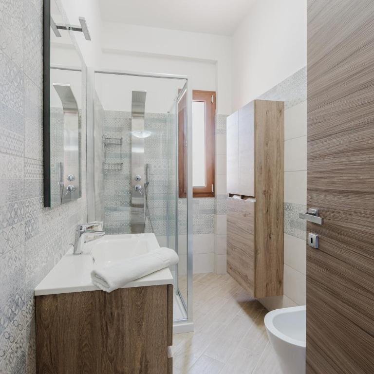 Villa Tramonti - Appartamento Deluxe con 2 Camere da Letto e Vista Giardino - 18