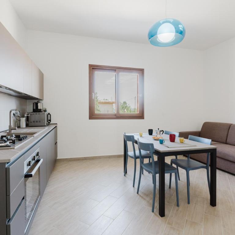 Villa Tramonti - Appartamento Deluxe con 2 Camere da Letto e Vista Giardino - 11