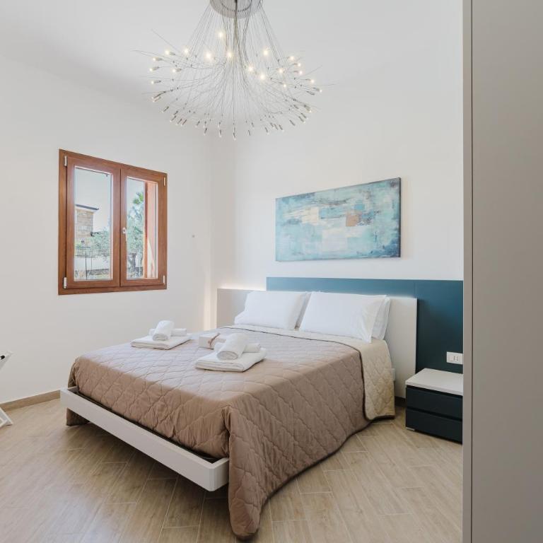Villa Tramonti - Appartamento Deluxe con 2 Camere da Letto e Vista Giardino - 1