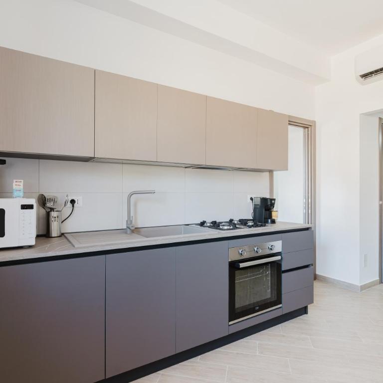 Villa Tramonti - Appartamento Deluxe con 2 Camere da Letto e Vista Giardino - 16