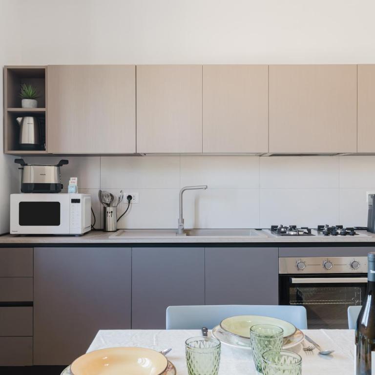 Villa Tramonti - Appartamento Deluxe con 2 Camere da Letto e Vista Giardino - 14