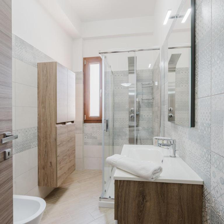 Villa Tramonti - Appartamento Deluxe con 2 Camere da Letto e Vista Giardino - 19