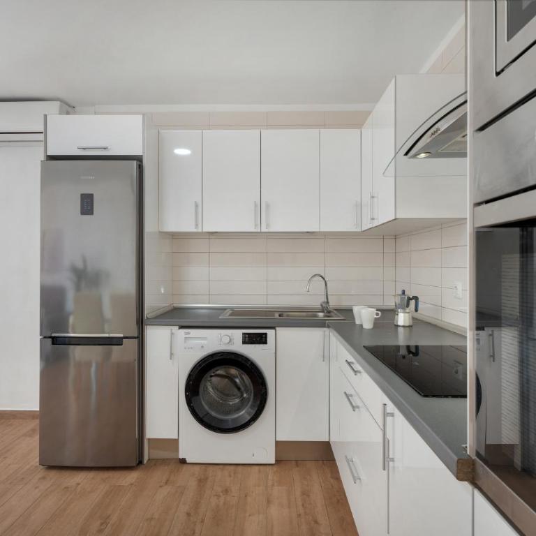Beach Holidays - Two-Bedroom Deluxe Apartment with Garden View - 7