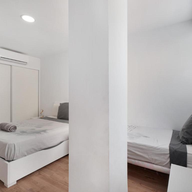 Beach Holidays - Two-Bedroom Deluxe Apartment with Garden View - 17
