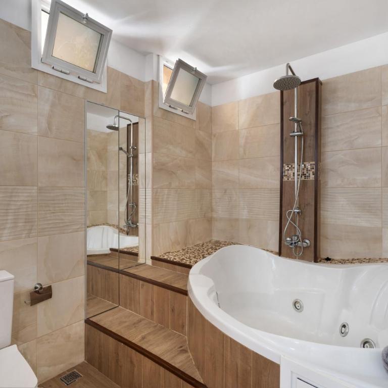 Beach Holidays - Two-Bedroom Deluxe Apartment with Garden View - 14